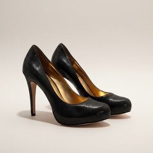 BCBGeneration Black Leather “Parade”Snake Print Platform heels size 8